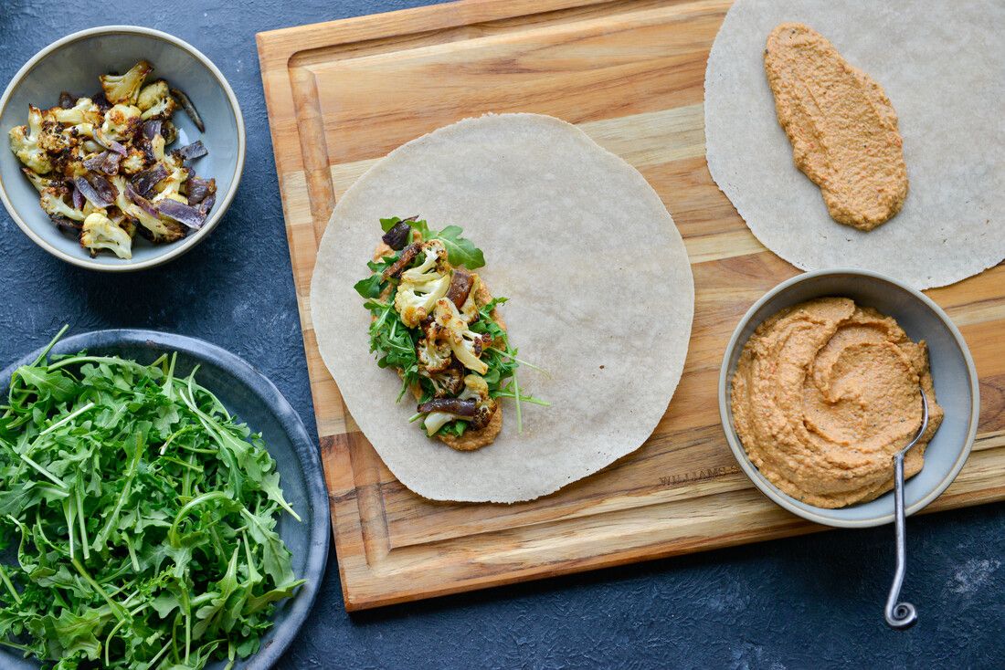Roasted Cauliflower and Arugula Wraps with Red Pepper Chickpea Spread