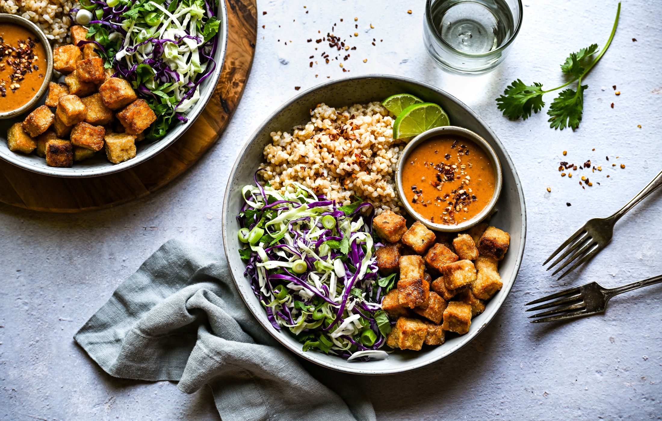 CRISPY TOFU, BROWN RICE, AND CABBAGE BOWLS WITH A PEANUT-CHILI-LIME SAUCE- VEGAN