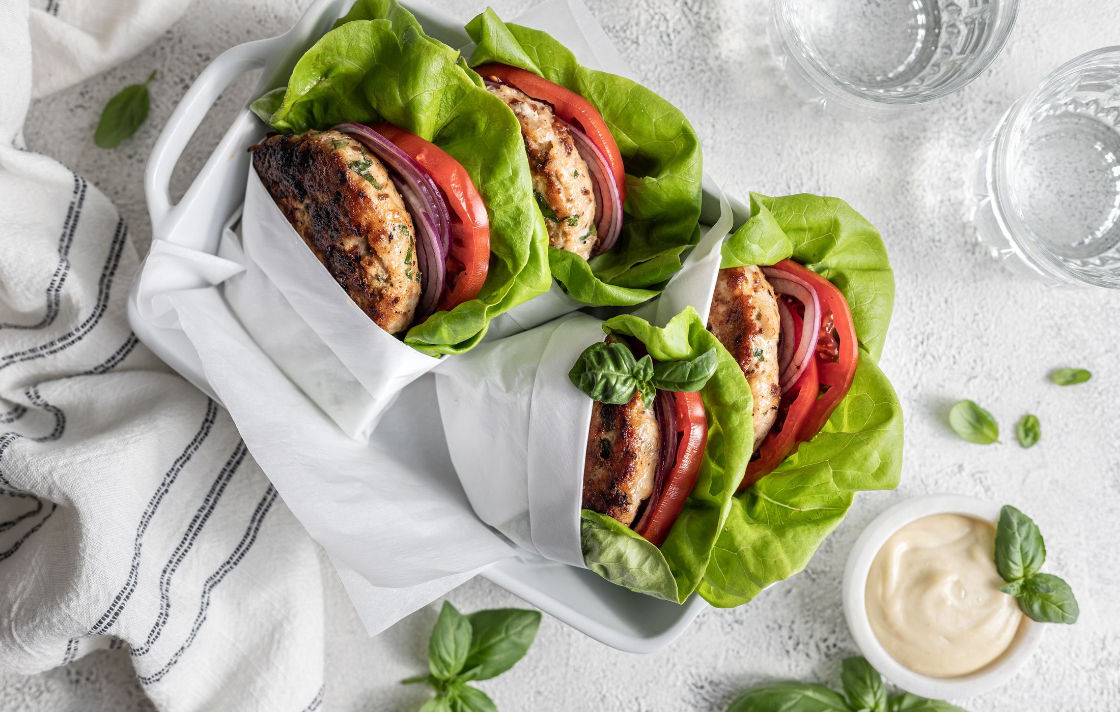 Chicken Burger with sun-dried tomato, feta, and basil